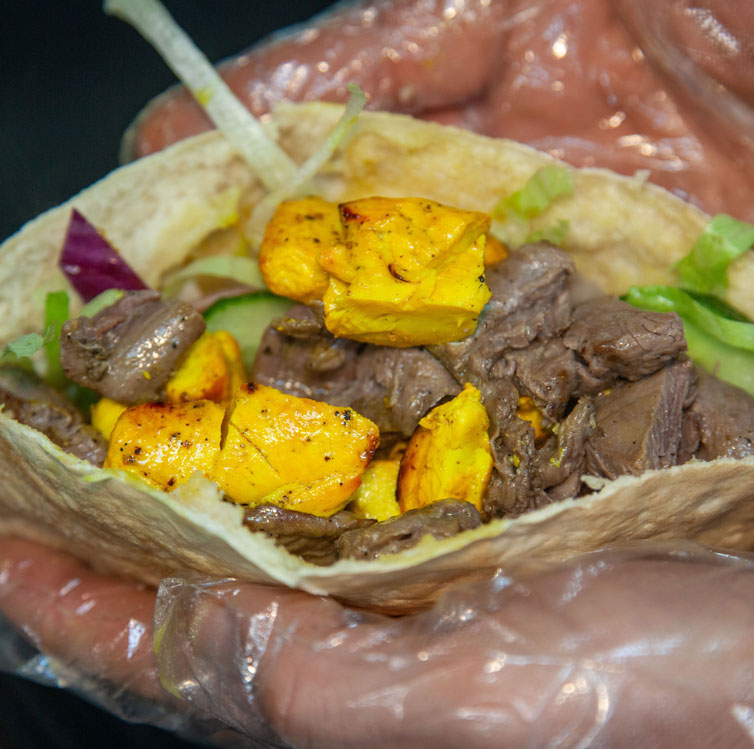 Mama Mia mixed kebab meat (chicken and beef) with salad in a pita bread.